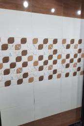 Rudraksha Zest Cement 12 x 18 inch Brown and White Polish Ceramic Tile_0